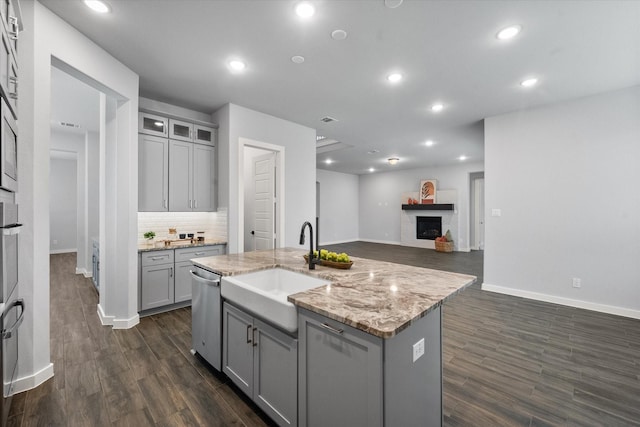 2812 Bluff Creek Dr, Mansfield, TX 76063 - kitchen featuring a sink, gray cabinets, stainless steel dishwasher, and dark wood-style flooring