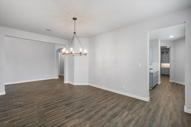 2812 Bluff Creek Dr, Mansfield, TX 76063 - unfurnished dining area featuring baseboards, visible vents, dark wood finished floors, and a chandelier