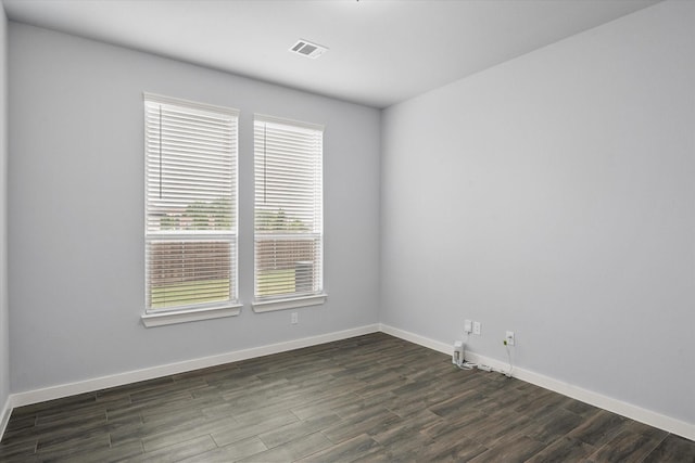 2812 Bluff Creek Dr, Mansfield, TX 76063 - empty room with baseboards, dark wood-style flooring, and visible vents