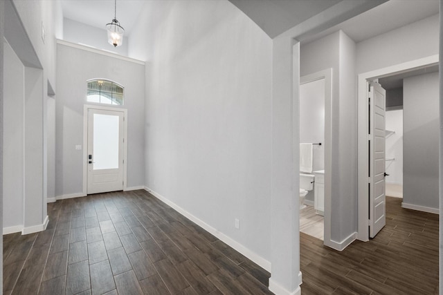 2812 Bluff Creek Dr, Mansfield, TX 76063 - entryway with dark wood-style flooring and baseboards
