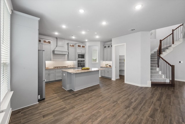 2812 Bluff Creek Dr, Mansfield, TX 76063 - kitchen featuring custom range hood, recessed lighting, tasteful backsplash, and stainless steel appliances