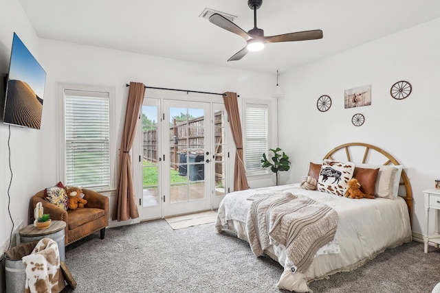 carpeted bedroom with a ceiling fan and access to exterior