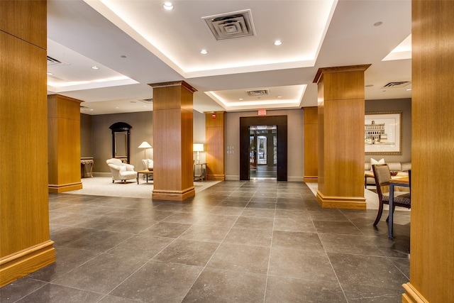 building lobby featuring visible vents