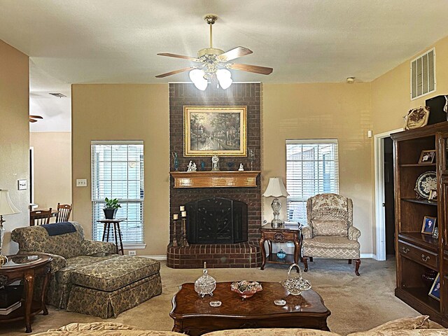 1561 Waterford Dr, Lewisville, TX 75077 - living area with carpet flooring, ceiling fan, a fireplace, and baseboards