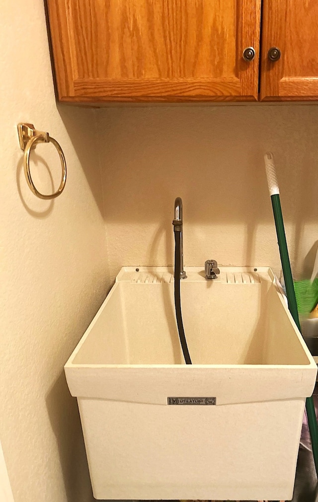 1561 Waterford Dr, Lewisville, TX 75077 - detailed view of a sink and a textured wall