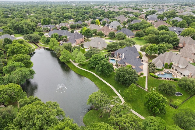 aerial view with a water view and a residential view
