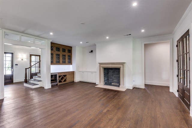 7538 Centenary Ave, Dallas, TX 75225 - unfurnished living room with crown molding, a fireplace with flush hearth, dark wood-style floors, recessed lighting, and stairway