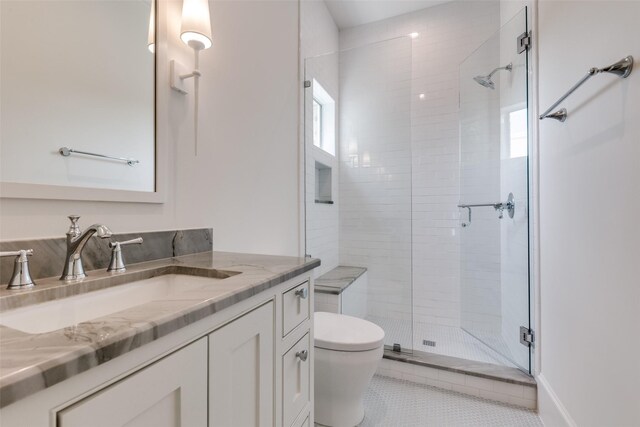 7538 Centenary Ave, Dallas, TX 75225 - bathroom with toilet, a stall shower, vanity, and tile patterned floors