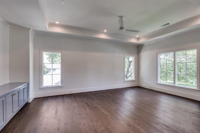 7538 Centenary Ave, Dallas, TX 75225 - spare room featuring a tray ceiling, plenty of natural light, crown molding, dark wood finished floors, and a ceiling fan