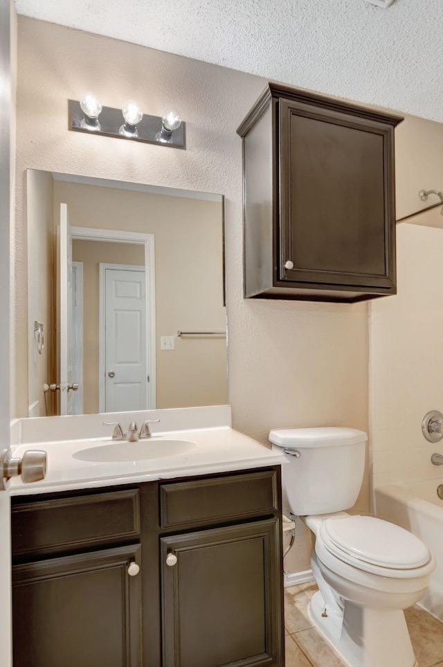 bathroom with tile patterned flooring, vanity, toilet, a textured ceiling, and shower / bathing tub combination