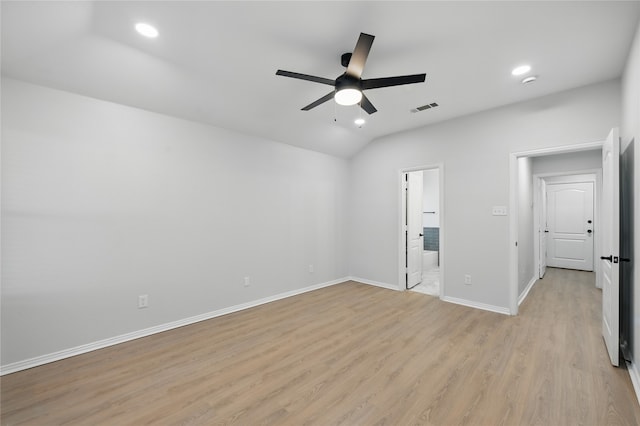 unfurnished bedroom featuring visible vents, recessed lighting, light wood-style floors, and lofted ceiling