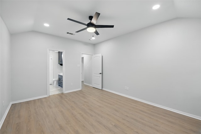 unfurnished bedroom with visible vents, recessed lighting, and vaulted ceiling