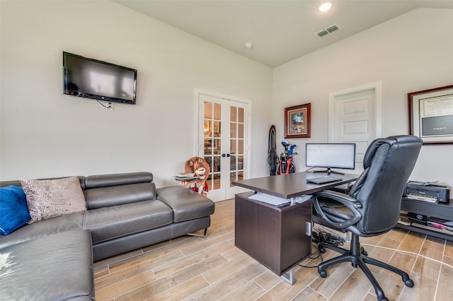 office featuring recessed lighting, french doors, light wood finished floors, and visible vents