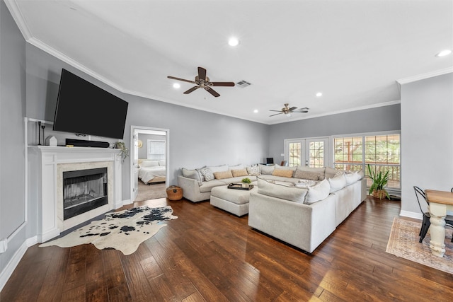 living room featuring visible vents, recessed lighting, and hardwood / wood-style floors
