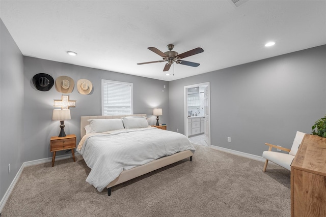 bedroom featuring baseboards, recessed lighting, and light carpet