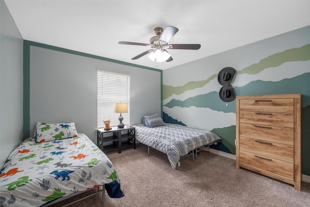 bedroom featuring baseboards, ceiling fan, and carpet flooring