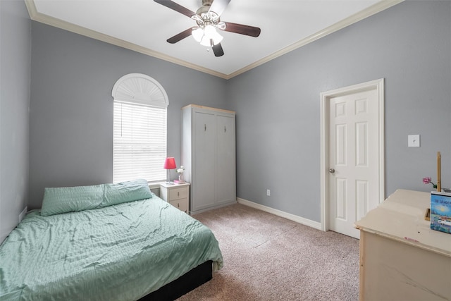 bedroom featuring a ceiling fan, baseboards, light colored carpet, and ornamental molding