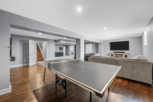 playroom featuring recessed lighting, baseboards, and dark wood-type flooring