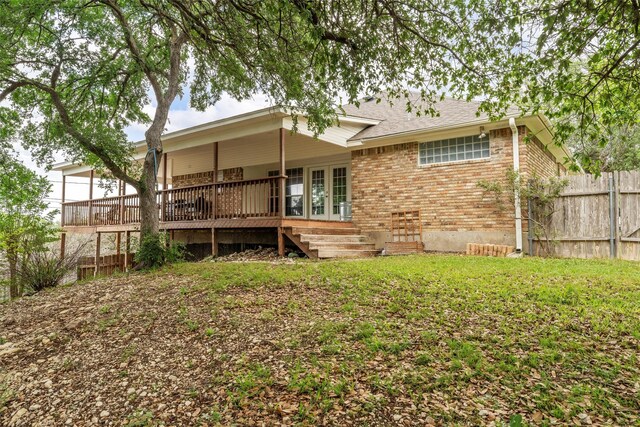 1108 Amberidge Ter, Woodway, TX 76712 - back of house featuring french doors, brick siding, and a deck