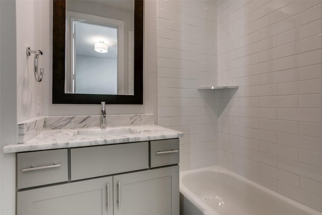 full bath with tub / shower combination and vanity