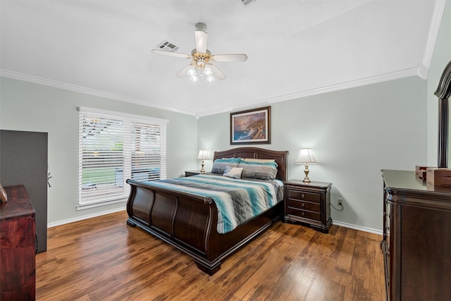 bedroom with baseboards, visible vents, ornamental molding, and wood finished floors