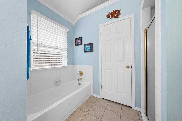 full bathroom with crown molding, a bath, baseboards, and tile patterned flooring