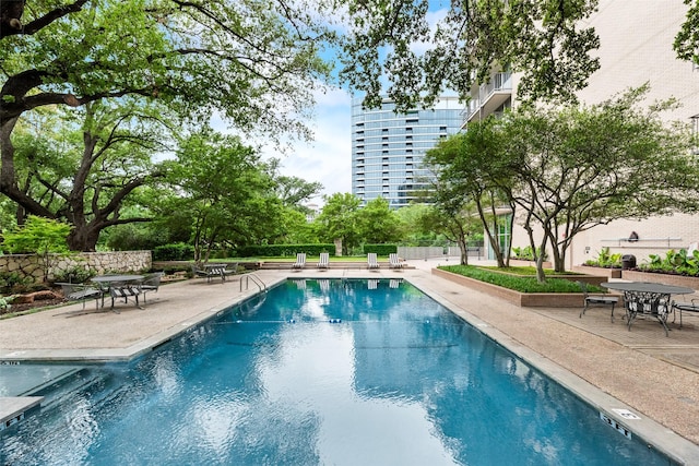 pool with a patio