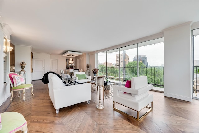 living area with floor to ceiling windows and ornamental molding