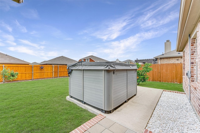 view of outdoor structure featuring a fenced backyard