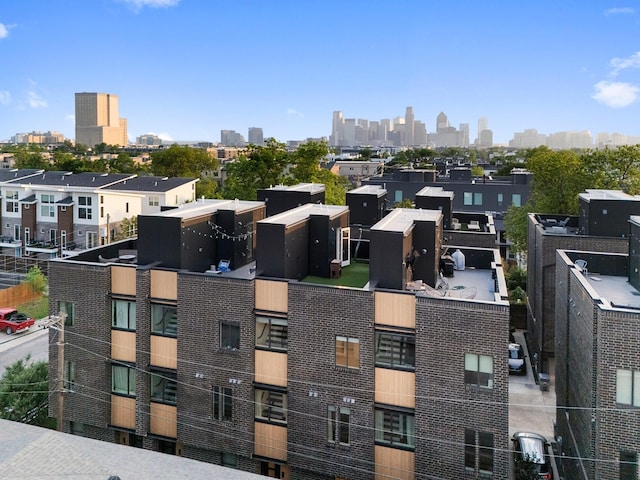 birds eye view of property with a city view