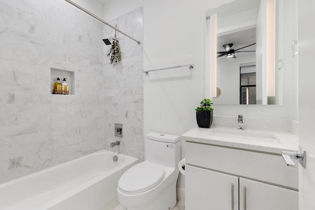 bathroom with toilet, a ceiling fan, shower / bath combination, and vanity
