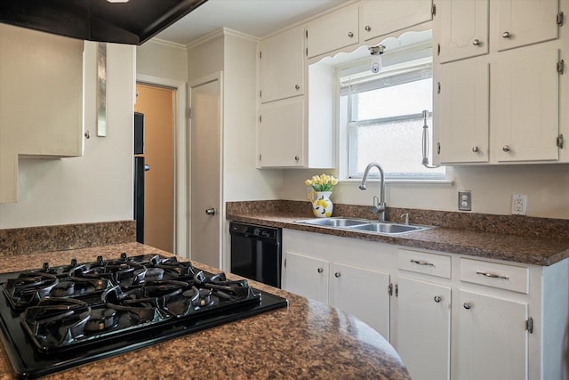 kitchen with a sink, under cabinet range hood, black appliances, dark wood-style flooring, and white cabinetry