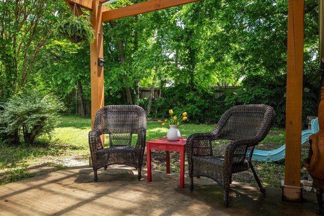 view of green lawn featuring a pergola