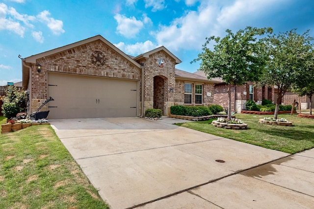 1223 Trevino Rd, Forney, TX 75126 - view of front of home featuring an attached garage, driveway, a front yard, and brick siding