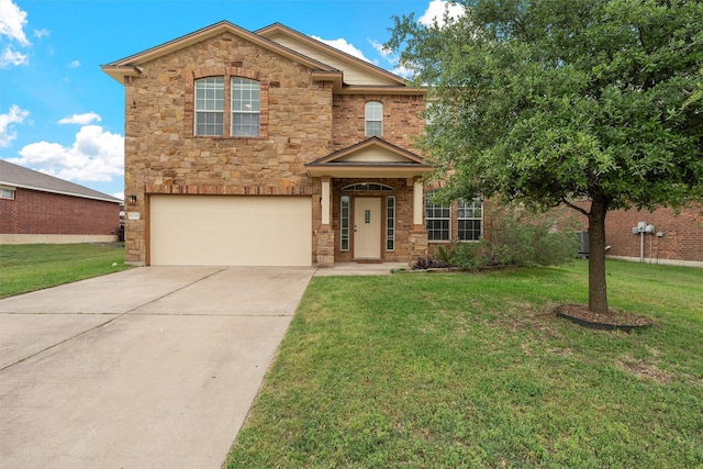 6728 Tierra Dr, Woodway, TX 76712 - traditional-style home featuring a garage, driveway, a front lawn, and stone siding