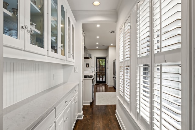 hall featuring crown molding, recessed lighting, dark wood finished floors, and visible vents