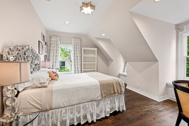 bedroom with dark wood-style flooring, baseboards, recessed lighting, and lofted ceiling