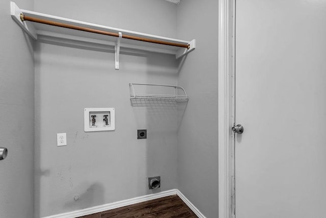 washroom featuring laundry area, hookup for a washing machine, electric dryer hookup, hookup for a gas dryer, and dark wood-type flooring