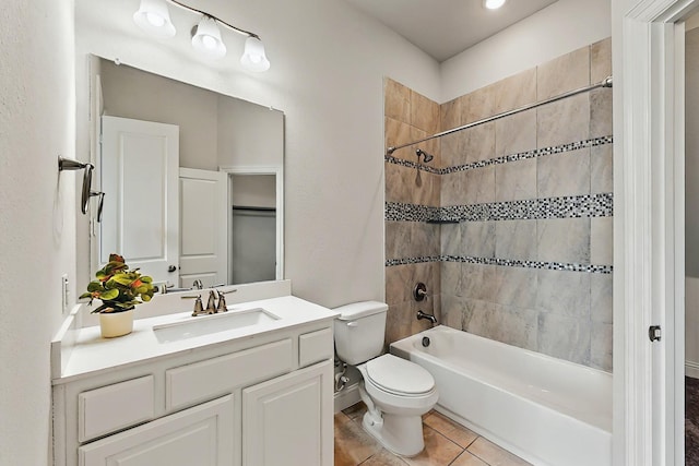 full bath with bathing tub / shower combination, tile patterned flooring, vanity, and toilet