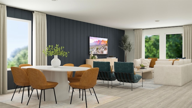 dining space featuring light wood-type flooring