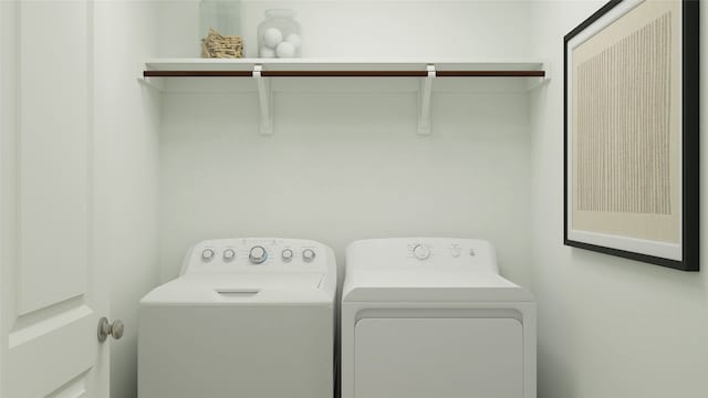 clothes washing area with laundry area and washing machine and dryer