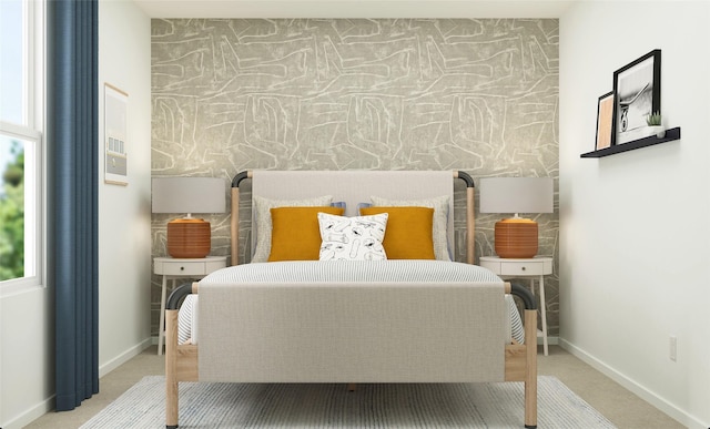 bedroom with baseboards, carpet, an accent wall, and wallpapered walls
