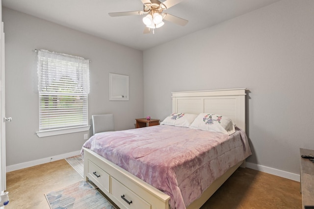 bedroom featuring a ceiling fan and baseboards
