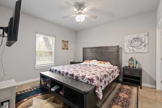 bedroom with baseboards and ceiling fan
