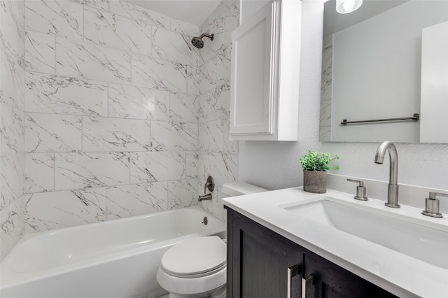 bathroom featuring toilet, shower / washtub combination, and vanity