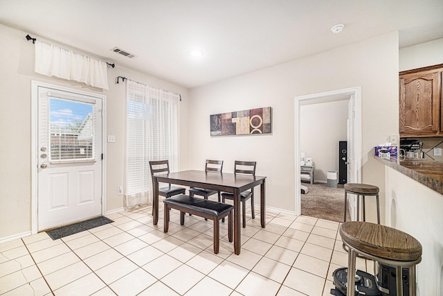 dining space with recessed lighting, baseboards, visible vents, and light tile patterned floors