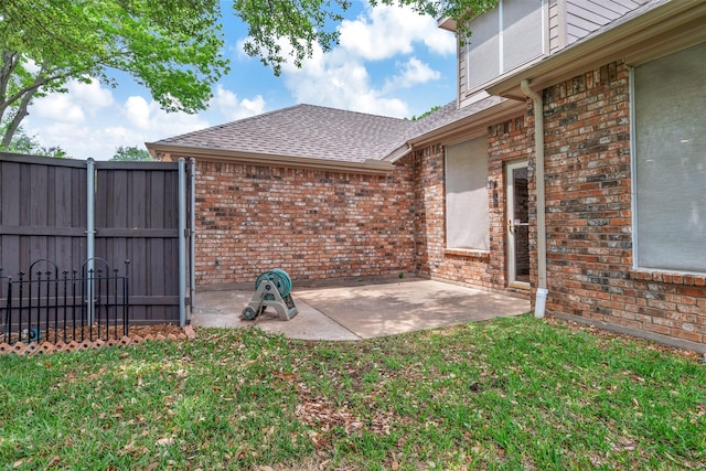 view of patio / terrace featuring fence