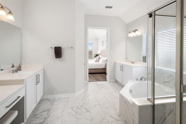 5604 Deer Run Dr, Celina, TX 75009 - ensuite bathroom with visible vents, a sink, marble finish floor, and a garden tub
