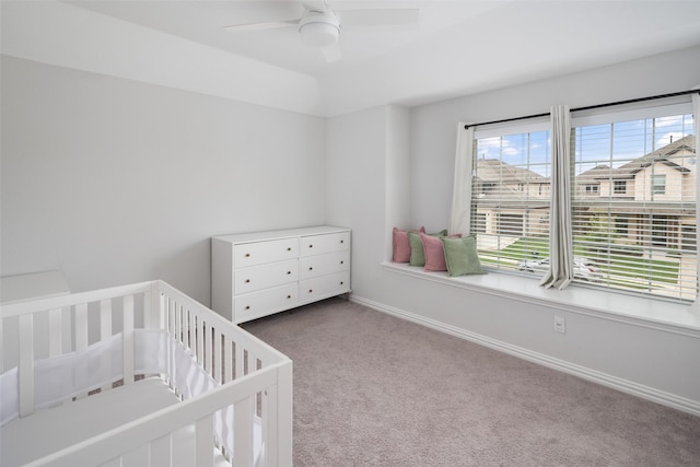 5604 Deer Run Dr, Celina, TX 75009 - bedroom featuring carpet floors, a ceiling fan, baseboards, and a crib