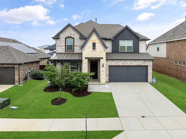 french country inspired facade with a shingled roof, an attached garage, driveway, and a front yard